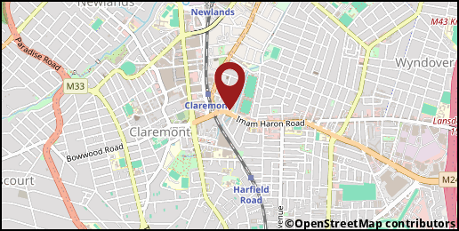 a map with a pin at -33.9835,18.4693